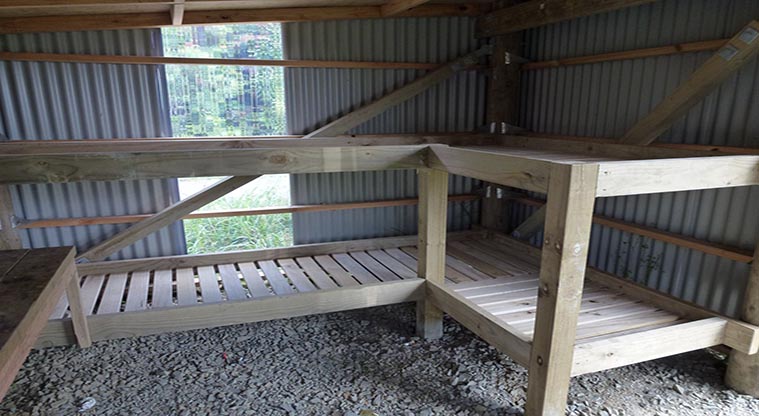 Repeater campground - Wooden bunks inside the shelter.