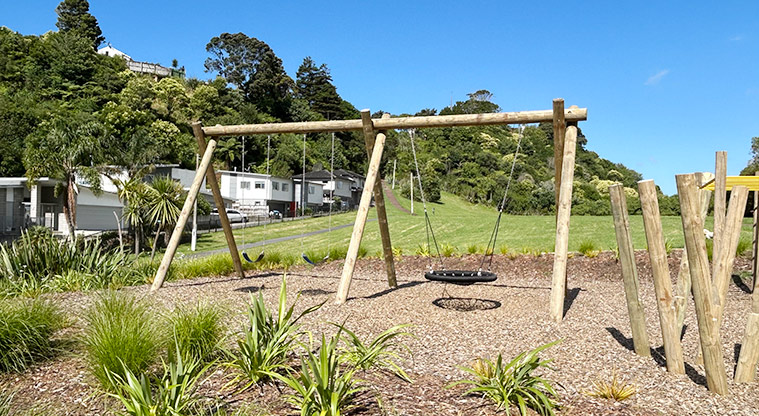Arch Hill Scenic Reserve - Swing set, and wooden poles and stumps for weaving through and balancing on. Photo credit: S Hulse.