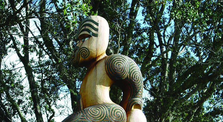 Cornwallis, Waitākere Ranges Regional Park - Pou whenua (land post) depicting Hape, an ancestor of the local Kawerau-a-Maki tribe.