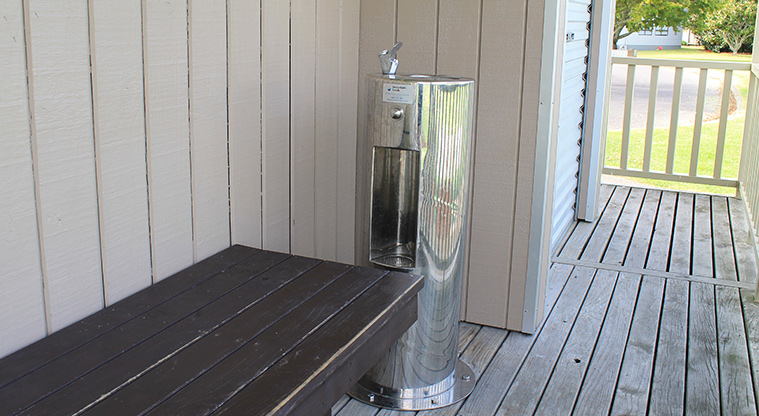 Edith Hopper Park - Water fountain on the deck of the Whangaparāoa Tennis Club building. Photo credit: M Loubser.