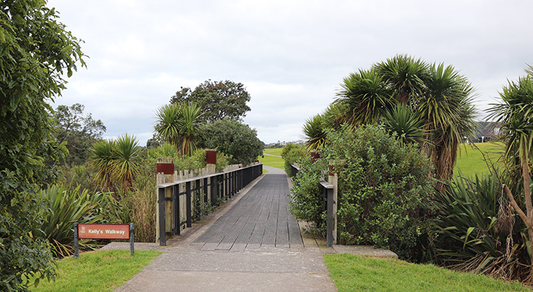 Leigh Auton Reserve - Entrance to Kelly's Walkway bridge with trees on both sides. Photo credit: S Hulse.