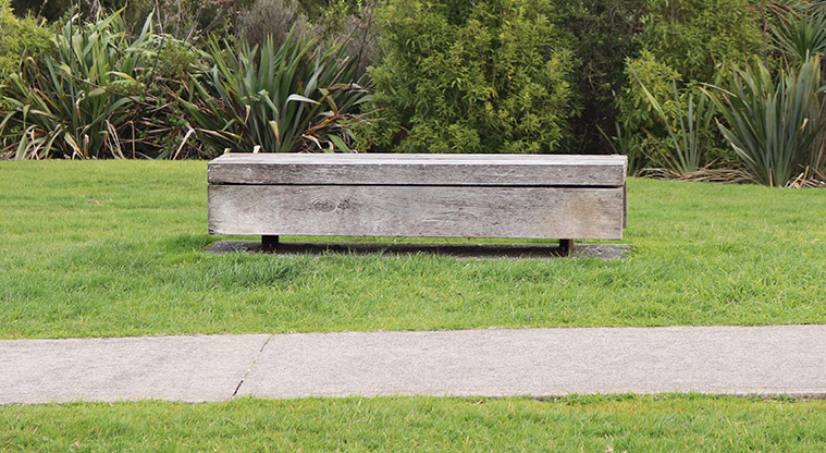 Leigh Auton Reserve - Large wooden bench seat beside one of the paths in the reserve. Photo credit: S Hulse.