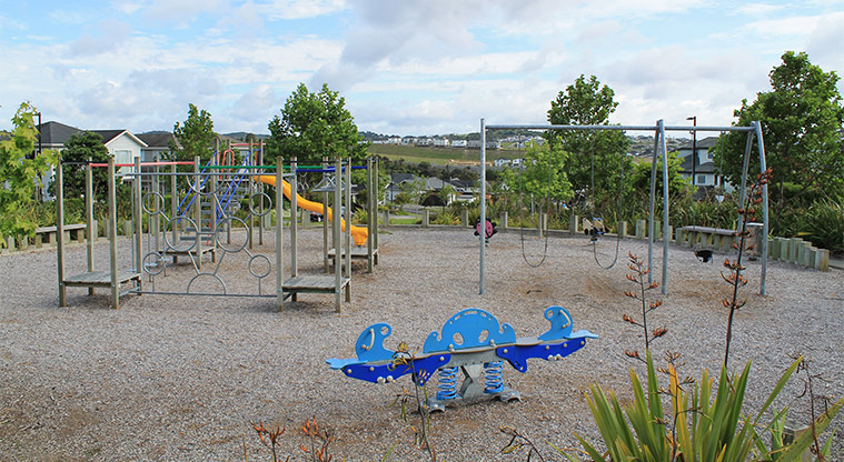 Major Henry Greens - Children's playground with climbing equipment, seesaw, swings, and rocker toys. Photo credit: M Loubser.