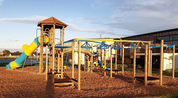 Meadowland Park - Playground with swinging and balancing equipment, bridge, slides and more.