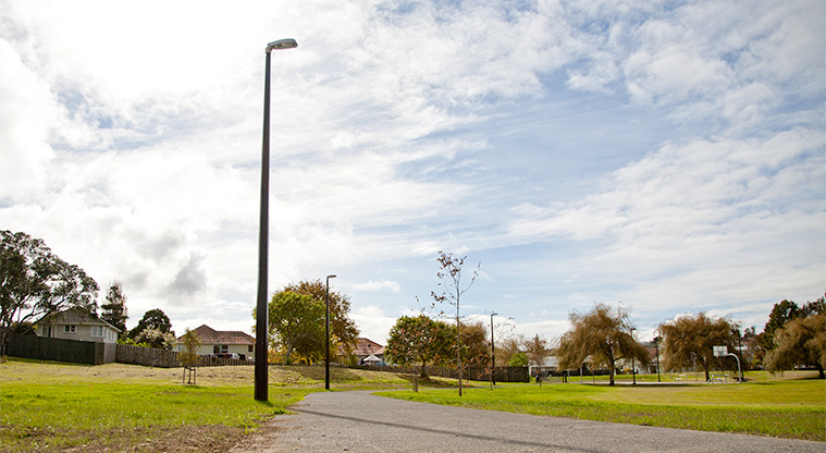 Molley Green Reserve - Wide path with lighting leading to the basketball court. Photo credit: Theo Leach.