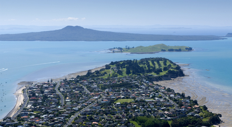 Motukorea / Browns Island Regional Park - Aerial view taken from above Bucklands Beach with Rangitoto Island in the background.