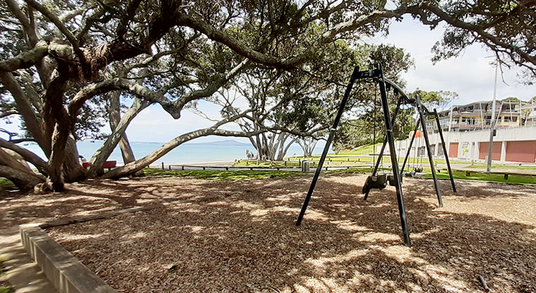 Murrays Bay Beach Reserve - Set of swings under the trees.