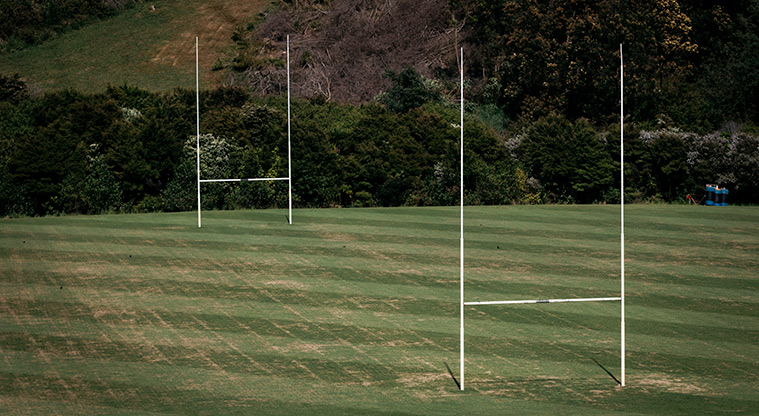 Onetangi Sports Park - Sports field with rugby goal posts at either end.