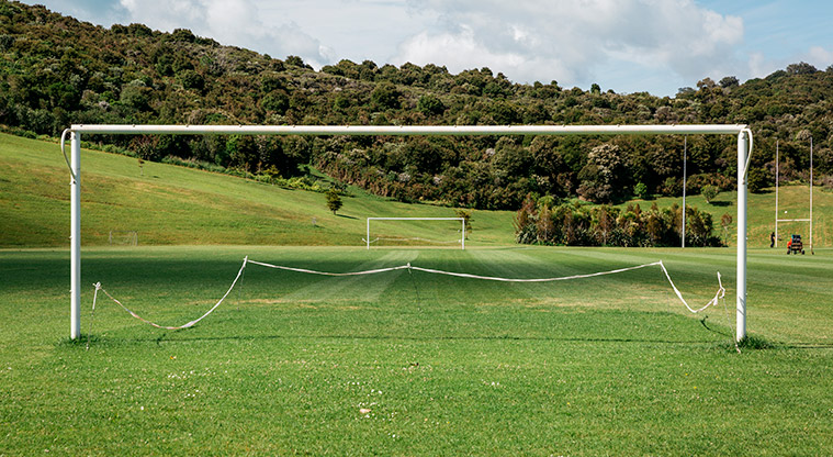 Onetangi Sports Park - Sports field with the soccer net frames at both ends.