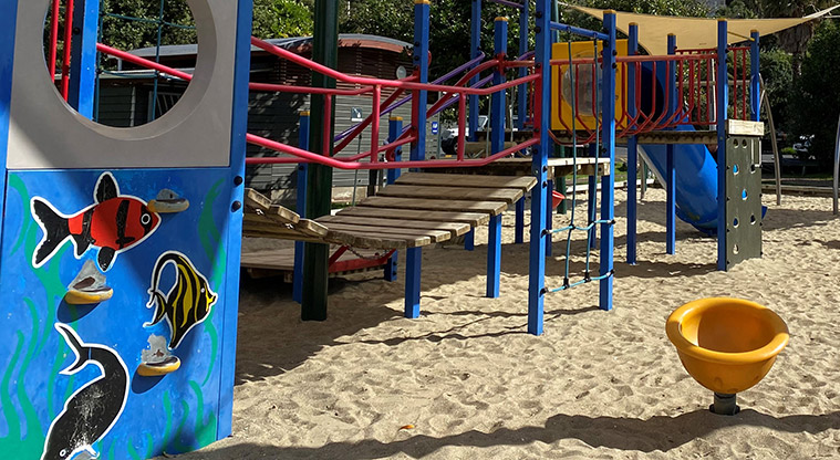 Palm Beach Reserve - A section of the playground with a wobbly bridge, climbing net and wall, spinning eggcup and more. Photo credit: T Hodder.