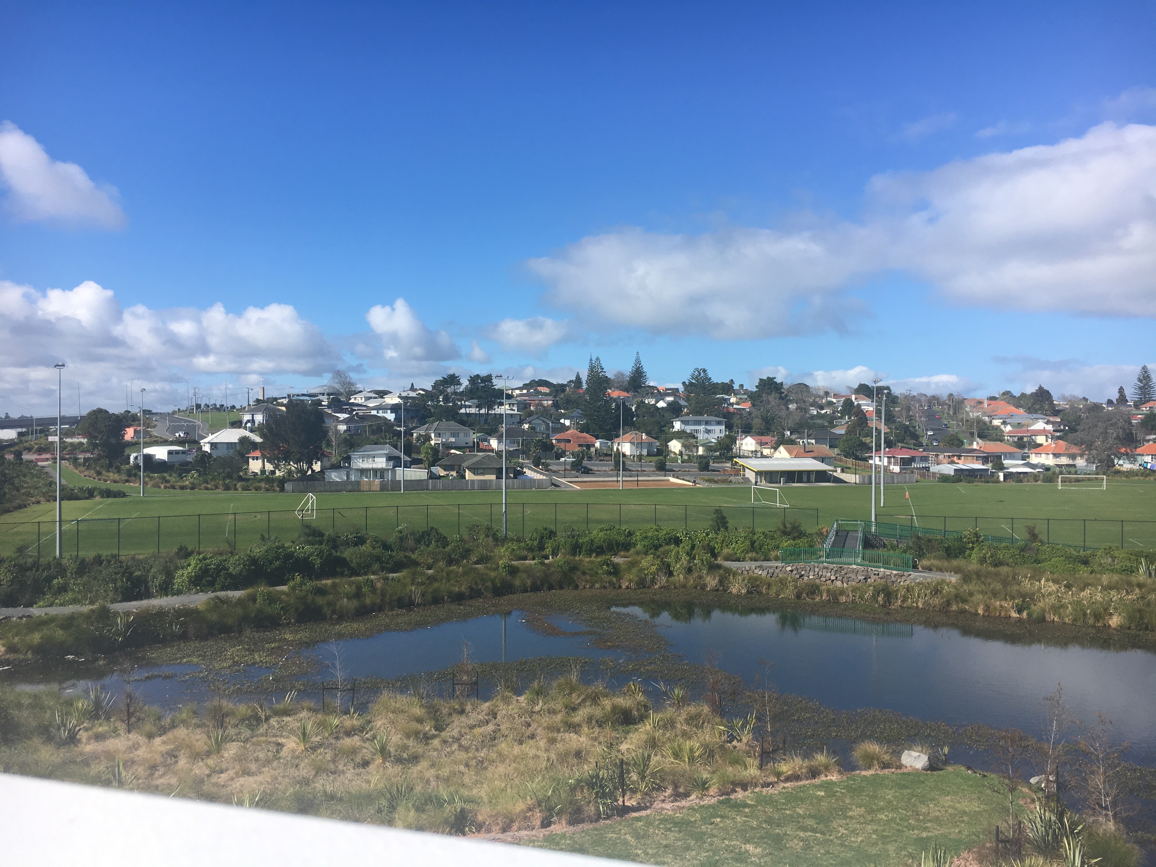 Alan Wood Reserve Path - Valonia Reserve sports fields and stormwater pond viewed from the bridge.